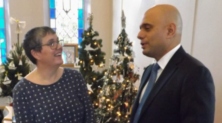 Minister at home at Christmas tree festival