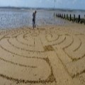 Baptist Minister's beach art creates intrigue 